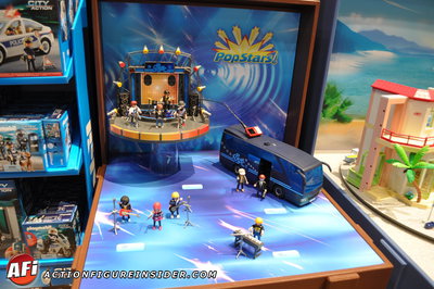 playmobil postars with stage and bus.jpg