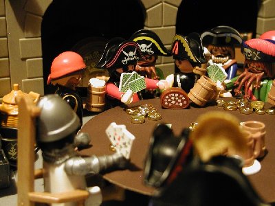Hafenkneipe03 wird ausgenommen.JPG (183.31 KiB) 1157 mal betrachtet Ein armer Ritter wird von den Piraten ausgenommen.