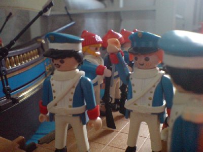 DSC02267.JPG (78.42 KiB) 1117 mal betrachtet "Der junge Mann hinter uns ist Fähnrich Piet Velthuizen. Er ist dafür abgestellt sich um ihre Bedürfnisse zu kümern." "Euer Majestät. Meine Herren."
