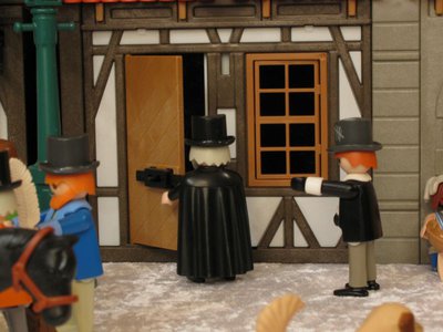 04_Tuer_Zu_20151203_0013.jpg (63.87 KiB) 3044 mal betrachtet Mr. Scrooge schließt das Kontor. Sein Schreiber verabschiedet sich fröhlich und macht sich auf den Weg zu seiner Familie.
