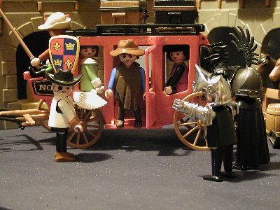 Rooster und Eastwood 2.jpg (168.17 KiB) 2022 mal betrachtet Dann drängeln die Damen in der Kutsche: "Wann geht es denn jetzt los? Ihr Helden!"